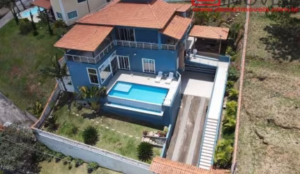 Imperdível oportunidade: Casa de alto padrão à venda em condomínio na Granja Caiapiá, Cotia-SP - 3 quartos, 1 suíte, 3 salas, 3 banheiros, 4 vagas, 377,80m²!