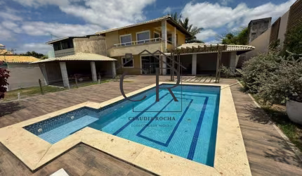 Fantástica casa em condomínio fechado com mega área externa, do ladinho de vilas do atlântico!!!
