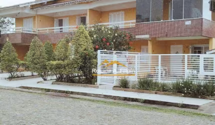 Casa com 3 dormitórios à venda, 156 m² por R$ 550.000 - Capão da Canoa/RS