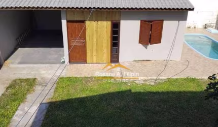 Casa com 3 dormitórios à venda, 170 m² por R$ 750.000 - Urussanguinha - Araranguá/SC