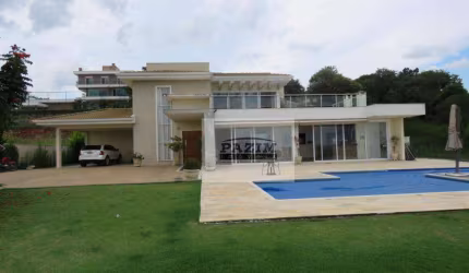 Casa térrea com 4 suítes à venda, 440 m² - Condomínio Jardim Primavera - Louveira/SP