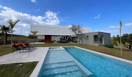Casa semi-mobiliada com 5 suítes, linda vista, ambientes integrados e terreno de 3800m2 à venda no Terras de São José II em Itu