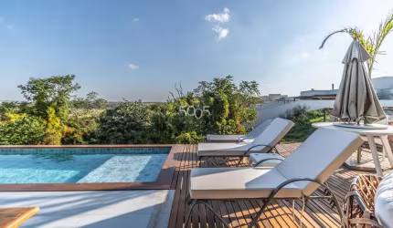 Linda casa à venda com 433m2 de construção e 461m2 de terreno. No piso térreo, 2 vagas cobertas, 3 suítes sendo 1 com closet, sala 2 ambientes