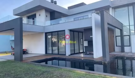Casa em condomínio fechado com 5 quartos à venda no Atlântida Sul (Distrito), Osório , 419 m2 por R$ 3.990.000