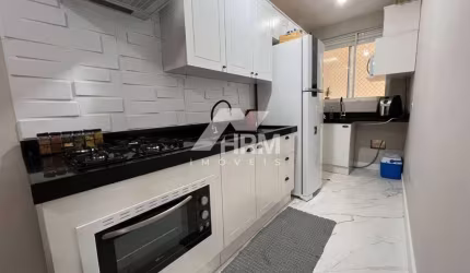 Apartamento 2 quartos, churrasqueira e 2 vagas em Camboriú