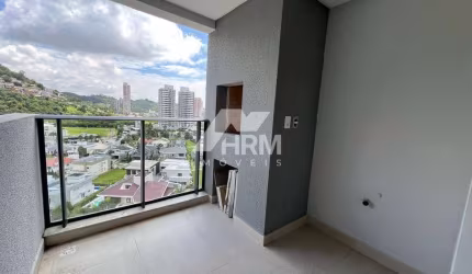 Apartamento na Praia Brava com 2 dormitórios sacada com churrasqueira