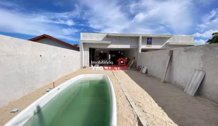 Casa nova com piscina perto do mar