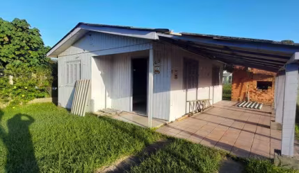Casa 2 Dormitórios à venda no Bairro Arroio Teixeira com 65 m² de área privativa