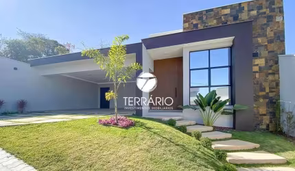 Casa à venda no Parque São José em Varginha com piscina, churrasqueira, 2 suítes e 3 quartos no Residencial Jardins