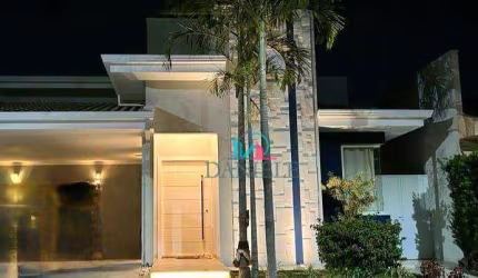 Casa térrea com 3 dormitórios suítes localizada no condomínio Acácias I.