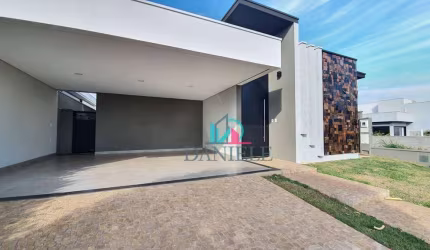 Casa térrea com 3 suítes localizada no condomínio Portal das Tipuanas.