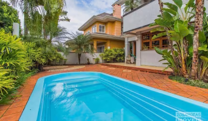 Sobrado com 3 suítes à venda, 470 m² por R$ 3.099.785 - Marechal Rondon - Canoas/RS