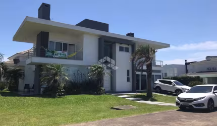Oportunidade Imperdível: Casa de Alto Padrão no Condomínio Ventura Club em Xangri-Lá!