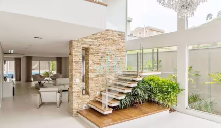 Casa com 4 dormitórios à venda, 667 m² por R$ 6.899.000,00 - Alphaville/SP
