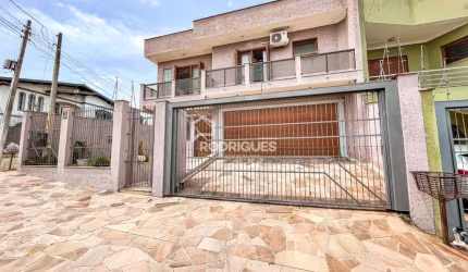Casa com 4 quartos à venda na Rua Jaime Zeltzer, 91, Jardim América, São Leopoldo por R$ 985.000