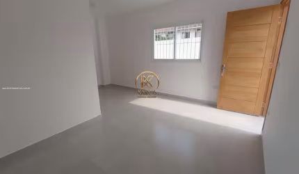 Sobrado Geminado para Venda em Guarujá, Vila Santo Antônio, 3 dormitórios, 2 banheiros, 2 vagas