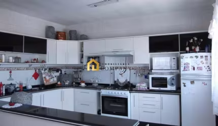 Sobrado residencial com salão comercial a venda na Vila Fiori