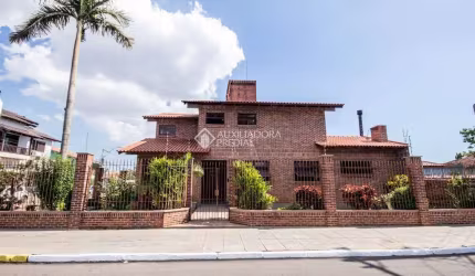 Casa com 4 quartos para alugar na Rua Tobias Barreto, 449, Nossa Senhora das Graças, Canoas, 286 m2 por R$ 11.000