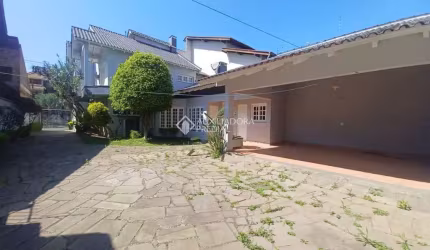 Casa com 3 quartos para alugar na Rua Cecília Meireles, 692, Marechal Rondon, Canoas, 249 m2 por R$ 6.900