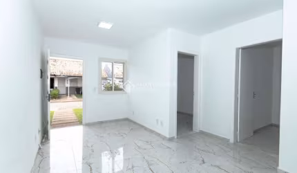 Casa em condomínio fechado com 2 quartos para alugar na Rua Brigadeiro Ivo Borges, 1000, São Luis, Canoas, 61 m2 por R$ 1.600