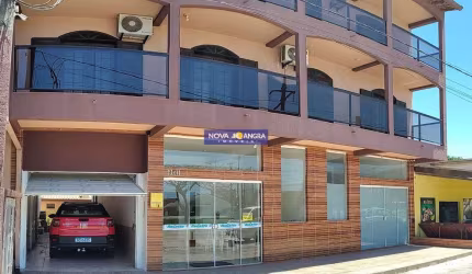 Prédio residêncial e comercial com 7 unidades