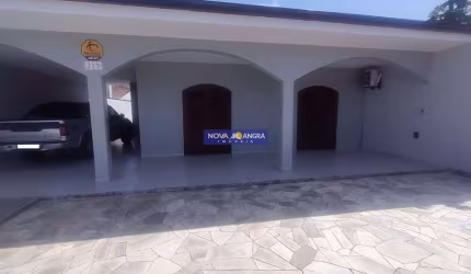 Residência com 03 dormitórios sendo 01 suíte á 2 quadras do mar