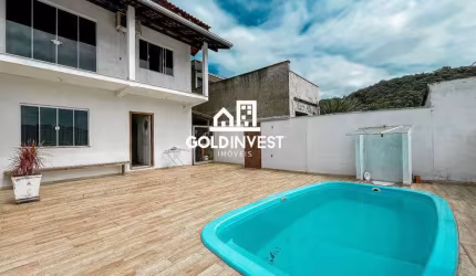 Casa espaçosa com 4 dormitórios, piscina e área de festas no Cedrinho