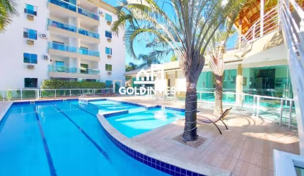 Apartamento com dois quartos e uma ampla área de lazer completa e com piscina.