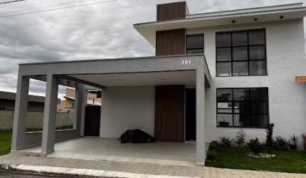 Casa com 3 dormitórios, 230 m² - venda por R$ 890.000,00 ou aluguel por R$ 5.417,00/mês - Bairro dos Guedes - Tremembé/SP