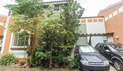 Casa em condomínio fechado com 3 quartos para alugar na Rua Tenente Ary Tarrago, 1720, Jardim Itu Sabará, Porto Alegre por R$ 2.500