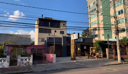 Casa comercial com 4 salas para alugar na Rua General Pedro Bittencourt, 115, Passo da Areia, Porto Alegre
