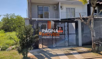 Página 1 Imóveis anuncia excelente sobrado para venda com 03 dormitórios, sendo 01 suíte, vaga para 02 carros no Loteamento Quinta do Palermo no Bairro Estância Velha, Canoas/RS. - SO92
