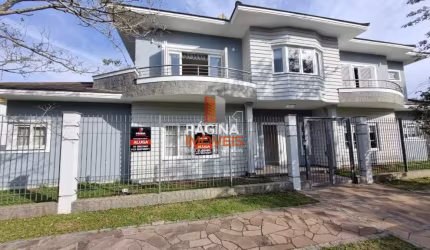Excelente opção de casa para aluguel e venda com 03 dormitórios 01 suíte e vaga para 04 carros no bairro Moinhos de Vento em Canoas/RS - CA66