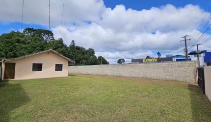 Casa com Amplo Terreno em Serra Alta