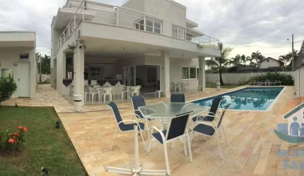 INCRÍVEL IMÓVEL DE ALTO PADRÃO COM VISTA PARA O MAR LOCALIZADO NO BAIRRO PRAIA DAS PALMEIRAS EM CARAGUATATUBA!