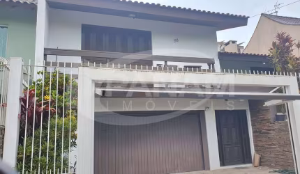 Casa com 4 quartos à venda na Rua Maestro Salvador Campanella, 58, Jardim Itu Sabará, Porto Alegre por R$ 1.025.000
