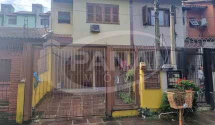 Casa com 3 quartos à venda na Rua Abdo Jorge Curi, 197, Parque Santa Fé, Porto Alegre por R$ 429.500