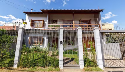 Casa com 3 quartos à venda na Rua Paulo Bento Lobato, 221, Jardim Lindóia, Porto Alegre por R$ 1.090.000