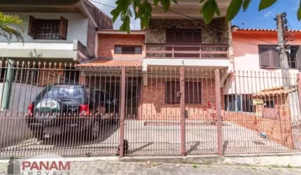 Casa com 3 quartos à venda na Rua Irene Capponi Santiago, 361, Jardim Floresta, Porto Alegre por R$ 945.000