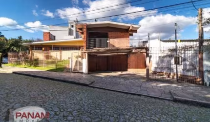 Casa com 3 quartos à venda na Rua Veronese, 297, São Sebastião, Porto Alegre por R$ 990.000