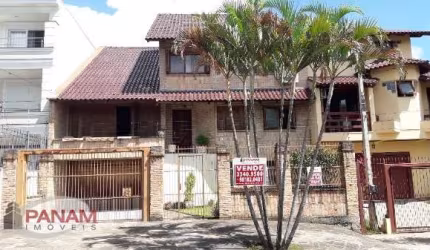 Casa com 5 quartos à venda na Rua Chafic João Scaf, 137, Jardim Itu Sabará, Porto Alegre por R$ 2.120.000