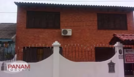 Casa com 4 quartos à venda na Rua Breno Arruda, 105, Santa Maria Goretti, Porto Alegre por R$ 649.000