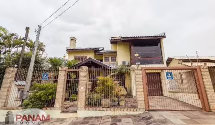 Casa com 4 quartos à venda na Travessa Porto Príncipe, 59, Jardim Lindóia, Porto Alegre por R$ 1.690.000