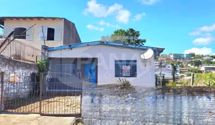 Casa com 2 quartos à venda na Rua Vinte e Seis de Dezembro, 481, Vila São José, Porto Alegre por R$ 395.000
