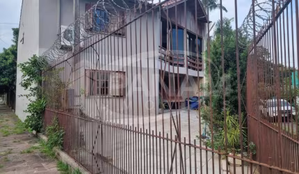 Casa com 3 quartos à venda na Rua Osmindo Júlio Kuhn, 186, Parque Santa Fé, Porto Alegre por R$ 1.300.000