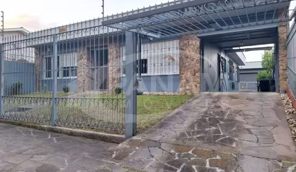 Casa com 3 quartos à venda na Rua Doutor Ney de Almeida Brito, 105, Jardim Lindóia, Porto Alegre por R$ 1.180.000