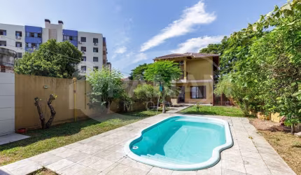 Casa com 3 quartos à venda na Rua Eugênio Du Pasquier, 283, Cristo Redentor, Porto Alegre por R$ 899.000