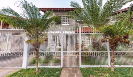 Casa com 4 quartos à venda na Rua Irmão Augusto, 100, Jardim Lindóia, Porto Alegre por R$ 1.550.000