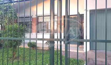 Casa com 3 quartos à venda na Rua Nicolau Copérnico, 45, Sarandi, Porto Alegre por R$ 590.000