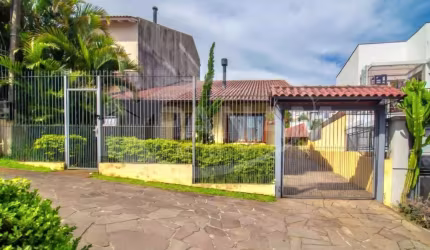 Casa com 4 quartos à venda na Avenida General Barreto Viana, 303, Chácara das Pedras, Porto Alegre por R$ 1.330.000